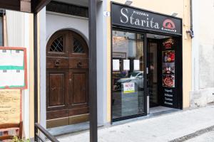 Certifikát, ocenenie alebo iný dokument vystavený v ubytovaní Roommo Apartments San Gallo