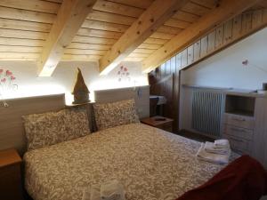 Postel nebo postele na pokoji v ubytování Hotel Aida