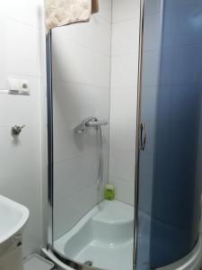 Kúpeľňa v ubytovaní Пансіон АГАВА