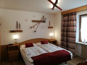 Postel nebo postele na pokoji v ubytování Hotel Aida