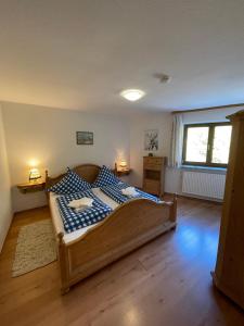 Letto o letti in una camera di Ferienwohnungen Zechmeister