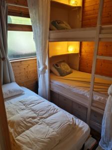 Postel nebo postele na pokoji v ubytování Charme chalet