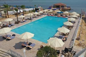 The swimming pool at or close to Jewel Fayed Hotel