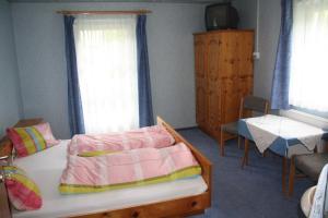 Postel nebo postele na pokoji v ubytování Casa da Honna