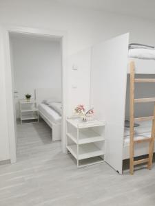 Ліжко або ліжка в номері Betariel Apartments M12
