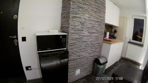 Kuchyň nebo kuchyňský kout v ubytování Hotel Marasesti