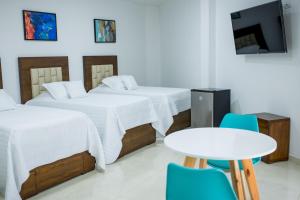 Postel nebo postele na pokoji v ubytování Solaris Hotel