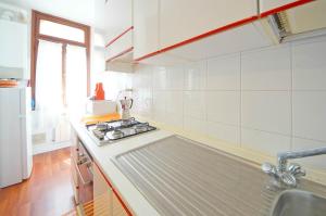 A kitchen or kitchenette at DolceVita Apartments N 285