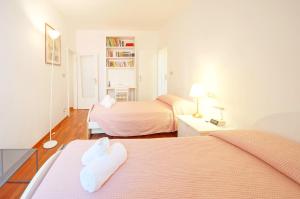 A bed or beds in a room at DolceVita Apartments N 285