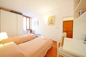 A bed or beds in a room at DolceVita Apartments N 285