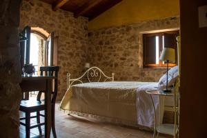 Vuode tai vuoteita majoituspaikassa Agriturismo Casale Ré