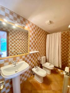 Et badeværelse på Hostal Villa Verde-Adults Only