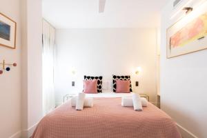 Postel nebo postele na pokoji v ubytování Salado Triana Suites by Valcambre