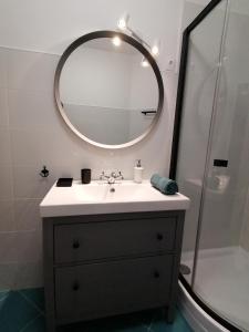 Kúpeľňa v ubytovaní Szamóca Apartman