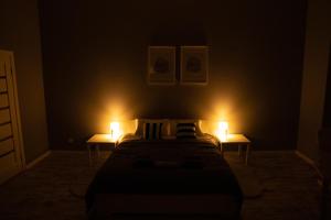 Posteľ alebo postele v izbe v ubytovaní Soho Apartments Lviv