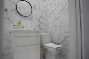 Kúpeľňa v ubytovaní Soho Apartments Lviv