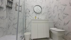 Kúpeľňa v ubytovaní Soho Apartments Lviv