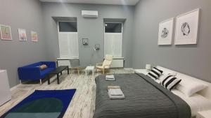 Posteľ alebo postele v izbe v ubytovaní Soho Apartments Lviv