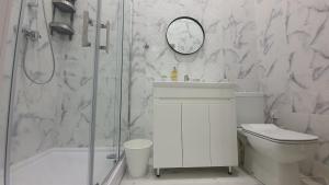 Kúpeľňa v ubytovaní Soho Apartments Lviv