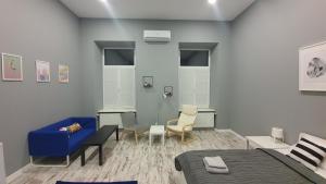 Posedenie v ubytovaní Soho Apartments Lviv