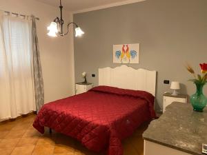 Postel nebo postele na pokoji v ubytování Villa Piruzzu CV Torre Mulinazzo app P + 24 fotografií