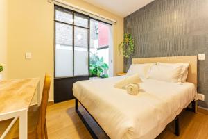 Postel nebo postele na pokoji v ubytování Casa Danubio near Reforma by VH