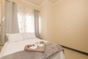 Voodi või voodid majutusasutuse Playa Flamingo, Stunning Sunset View Condominium Flamingo Towers 17 toas