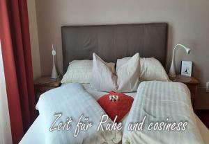 Postel nebo postele na pokoji v ubytování B&B Hotel das onkel fritz