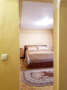 Ένα ή περισσότερα κρεβάτια σε δωμάτιο στο Квартиры на Володарского