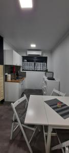 Cucina o angolo cottura di Gemütliches Tiny Home mit 30m2 inklusive Kochmöglichkeit