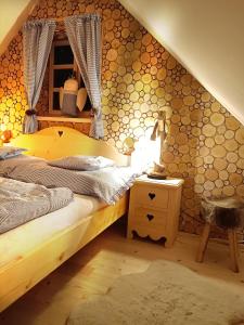 Postel nebo postele na pokoji v ubytování Chalet d' amour