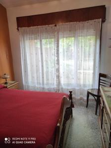
Una cama o camas en una habitación de Casa en barrio Villa Elvina
