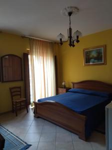 Postel nebo postele na pokoji v ubytování B&B Corso Italo Balbo