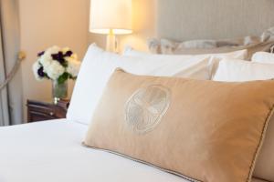 Postel nebo postele na pokoji v ubytování Hotel Drisco