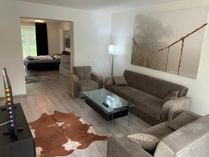 Posezení v ubytování Loftähnliche Ferienwohnung bei Hamburg
