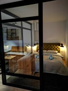 Postel nebo postele na pokoji v ubytování Apartman Mali Raj Zlatar