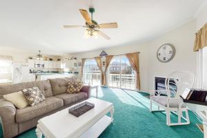 a living room with a couch and a table at Bayside View in Ocean City