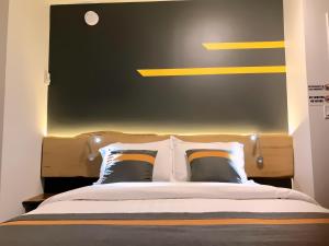 Postelja oz. postelje v sobi nastanitve Duncan Motel