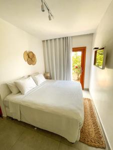 Кровать или кровати в номере Pousada Brisa Mar