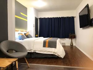Postelja oz. postelje v sobi nastanitve Duncan Motel
