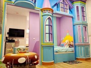TV o dispositivi per l'intrattenimento presso 墾丁舍廷親子會館 KT13 Hotel