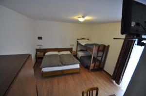 Postel nebo postele na pokoji v ubytování Hotel Sciatori