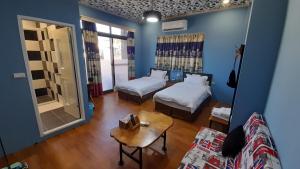 Vuode tai vuoteita majoituspaikassa Woolywo B&B 花蓮縣民宿第2451號