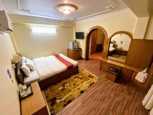 Llit o llits en una habitació de Hotel Bodhiz