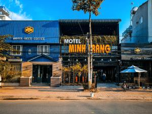 a building with a sign that reads motel minimumong at Minh Trang Motel in Chau Doc