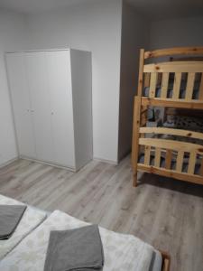 Posteľ alebo postele v izbe v ubytovaní Apartmány PRO LIPNO