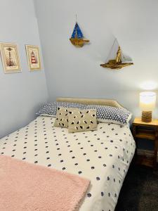 Кровать или кровати в номере Beach Retreat