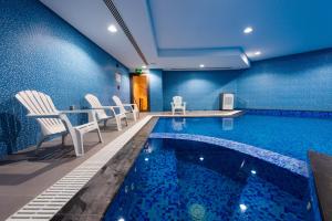 Bazén v ubytování ROZANA HOTEL nebo v jeho okolí