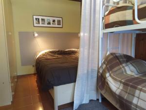 Voodi või voodid majutusasutuse Casa Gabriele con fantastica cabina doccia idromassaggio toas