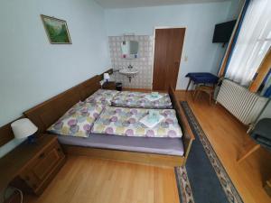 Postel nebo postele na pokoji v ubytování Haus Schattau